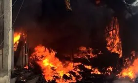 آتش سوزی گسترده در ۲۰ انبار مواد غذایی در نجف اشرف