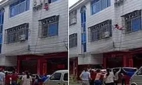 گرفتن کودک پرت شده از پنجره در هوا/ ویدئو