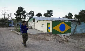 آوارگی از جنگ، حاشیه بزرگراهی در شیراز