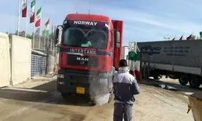 گندزدایی و ضدعفونی کامیون ها در پایانه های مرزی کرمانشاه