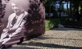 تصویری از تابوت حامل پیکر استاد شجریان