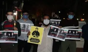 روشن کردن شمع مقابل کنسولگری افغانستان در مشهد