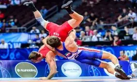 دستفروشی قهرمان کشتی جهان‌ در اندیمشک و برخورد عوامل اجرائیات شهرداری با او!/ ویدئو