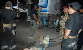 کشف یک تریلی حامل بمب و سلاح توسط نیروهای امنیتی عراق در بغداد + تصاویر