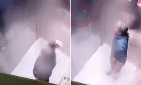 اقدام غیراخلاقی زن چینی در آسانسور/ ویدئو