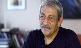 یکی از همان «پا برهنه»ها/ روایت تصویری پدر عکاسی قوم‌شناسی از عشقی 50 ساله