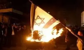 آتش زدن پرچم رژیم صهیونیستی در تظاهرات سودان