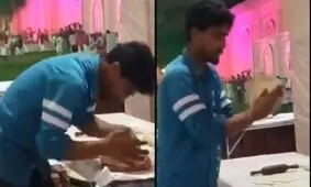 اقدام مشمئزکننده مرد قناد روی شیرینی عروسی!/ ویدئو