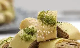 شیرینی‌های نوروزی در بخش‌های مختلف ایران/ از لقیمات جنوبی ها و برساق لرها تا کلمپه کرمانی ها/ عکس