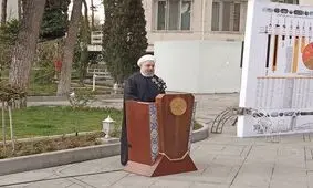 تصویری جالب از روحانی و وزرای دولت، زیر باران
