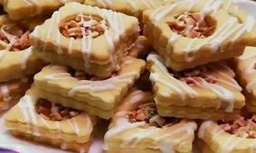 طرز تهیه شیرینی عسلی بادامی مغزدار