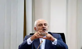 ظریف از کتاب ظریف و الملفات الکبری در بغداد رونمایی کرد/ عکس