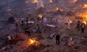 سوزاندن دسته جمعی قربانیان کرونا در پارکینگ/ ویدئو