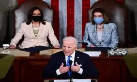 تصویر معنادار و تاریخی پشت سر بایدن/ عکس