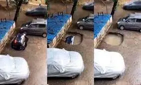 بلعیده شدن خودرو توسط گودال بزرگ پارکینگ/ ویدئو