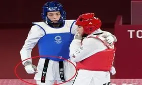 پرچم ایران روی کمربند کیمیا علیزاده/ عکس