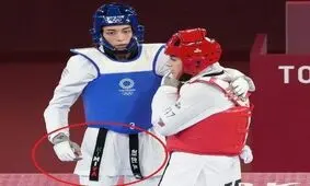 پرچم ایران روی کمربند کیمیا علیزاده/ عکس