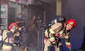 ۵ عکس از آتش سوزی در خیابان جمهوری اسلامی تهران