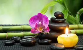 ماساژ سنگ داغ چگونه به سلامتی بدن شما کمک می‌کند؟