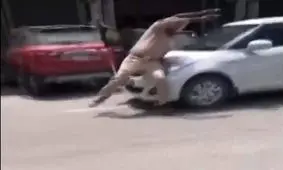 اقدام جنون آمیز راننده در زیرگرفتن پلیس/ ویدئو