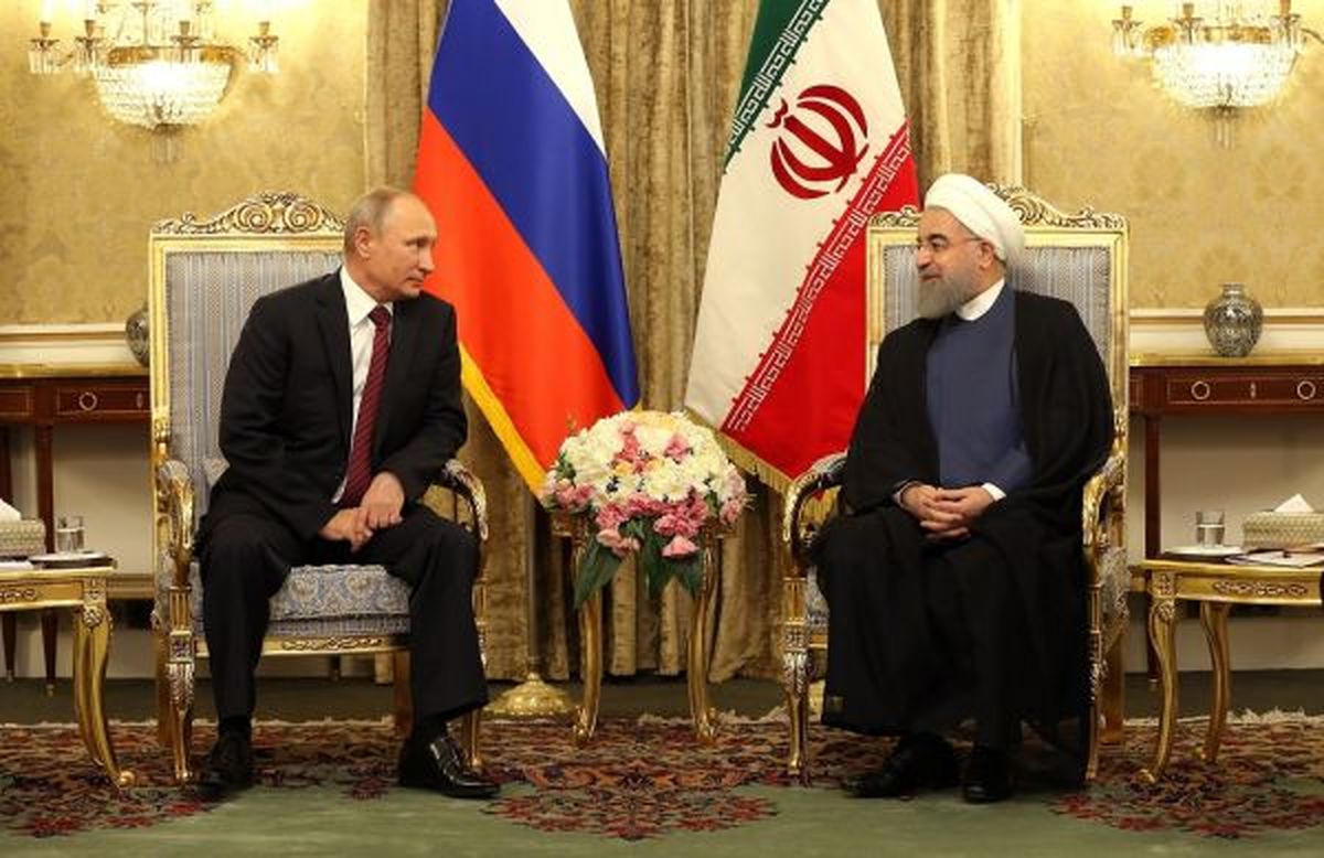 روحانی دست در دست پوتین