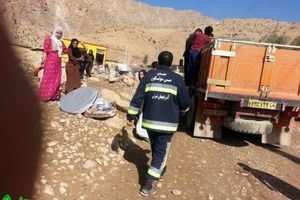 حضور یک اتش نشان داوطلب در منطقه ثلاث باباجانی