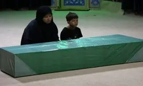 ماجرای عکسی که از غربت شهید تیپ فاطمیون منتشر شد