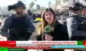 تعرض نظاميان صهيونيست به خبرنگار زن هنگام پوشش خبری/فیلم