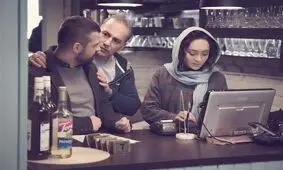 سعید معروف در کنار نیکی کریمی، در مراسم اکران فیلم سینمایی آذر