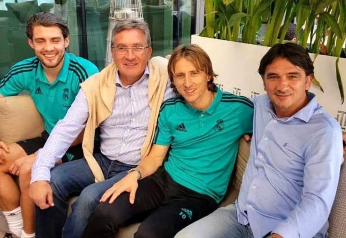 تصویری از برانکو در کنار بازیکن رئال مادرید