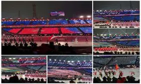 لحظه رژه ورزشکاران ایرانی در مراسم افتتاحیه المپیک زمستانی