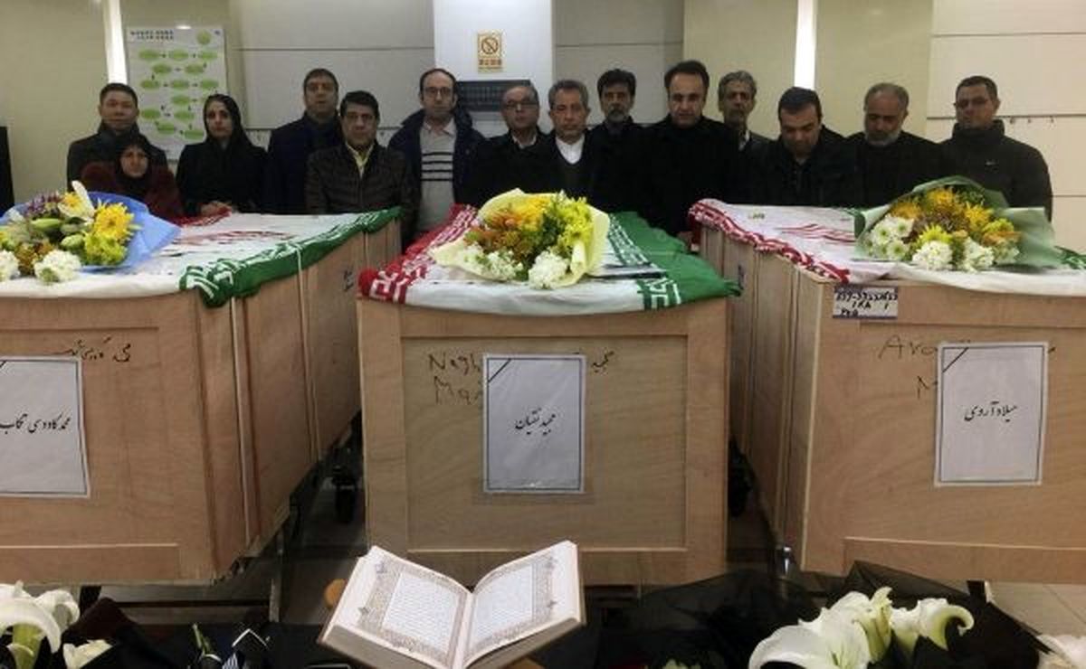 عکس/ آمادهسازی پیکر جانباختگان حادثه سانچی در شانگهای جهت انتقال به تهران