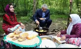 نوبخت در حال پخت نان محلی+عکس