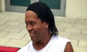 فوتبالیست معروف و فرزند خوانده‌اش! + عکس