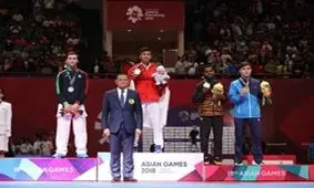 پسری که مدال طلا را از او‌ گرفتند