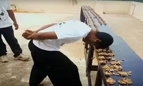 رکورد عجیب شکستن گردو با سر در گینس! + فیلم