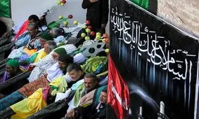 آئین سنتی علم‌بندان در روستای درخش قهستان خراسان جنوبی+تصویر