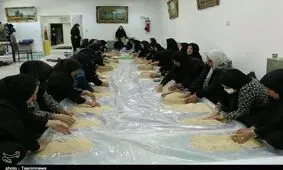 پخت ۱۳۰۰ کیلوگرم حلوا در حسینیه اعظم زنجان به روایت تصویر