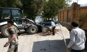 پاک‌سازی معابر شهر خرم‌آباد پس از اجرای آیین «گِل مالی»