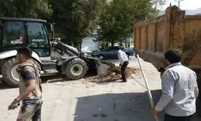 پاک‌سازی معابر شهر خرم‌آباد پس از اجرای آیین «گِل مالی»