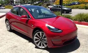 درگ تسلا مدل 3 پرفورمنس در مقابل تسلا رودستر اسپرت 2010