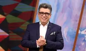 انتشار تصویری از شباهت رنگ لباس رضا رشیدپور به پرچم اوکراین 