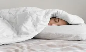 چرا باید با پتوی سنگین بخوابیم؟