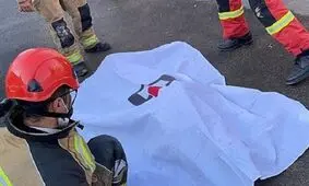مرگ هولناک کارگر جوان زیر دستگاه غلطک آسفالت کاری