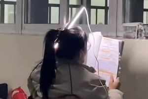 زن دانشجوی «چراغ به سر» چینی نماد سختکوشی شد