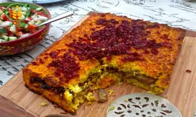 طرز تهیه ته‌چین گوشت و بادمجان خوشمزه به روش رستورانی
