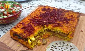 طرز تهیه ته‌چین گوشت و بادمجان خوشمزه به روش رستورانی
