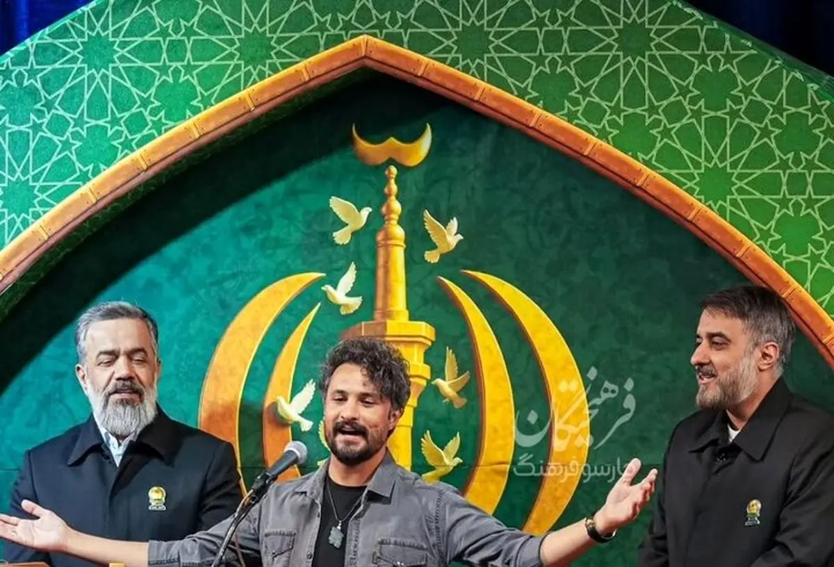 بوسه خواننده پاپ بر کتف محمود کریمی