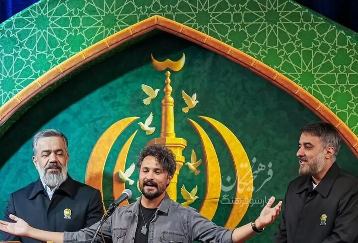 بوسه خواننده پاپ بر کتف محمود کریمی