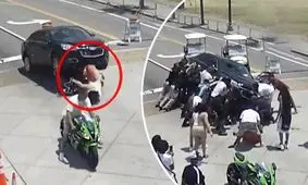 زیر گرفتن موتورسوار توسط خودروی لاکچری/ ویدئو